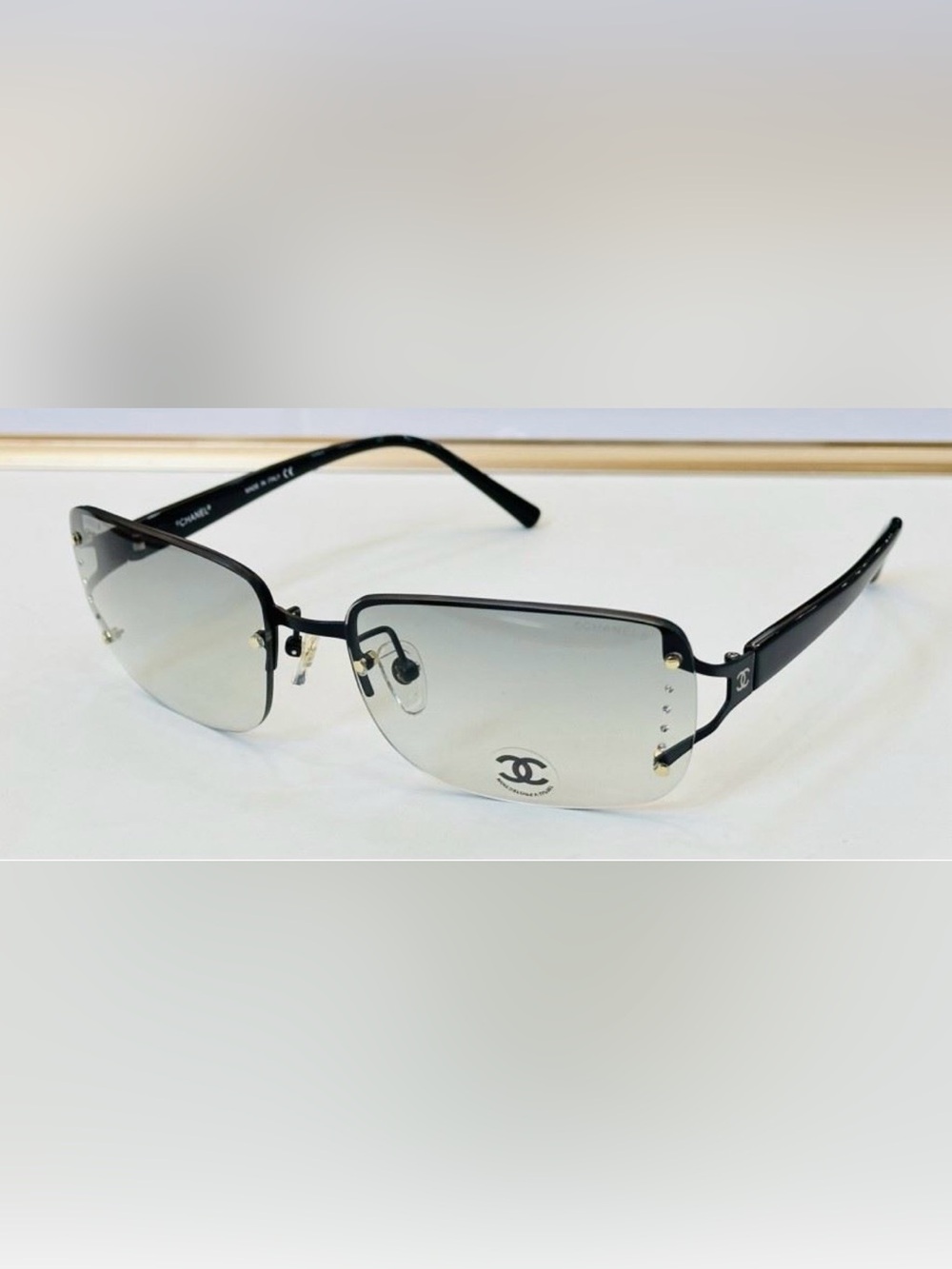 CHANEL Black Rimless Sunglasses with Gray Gradient Lenses